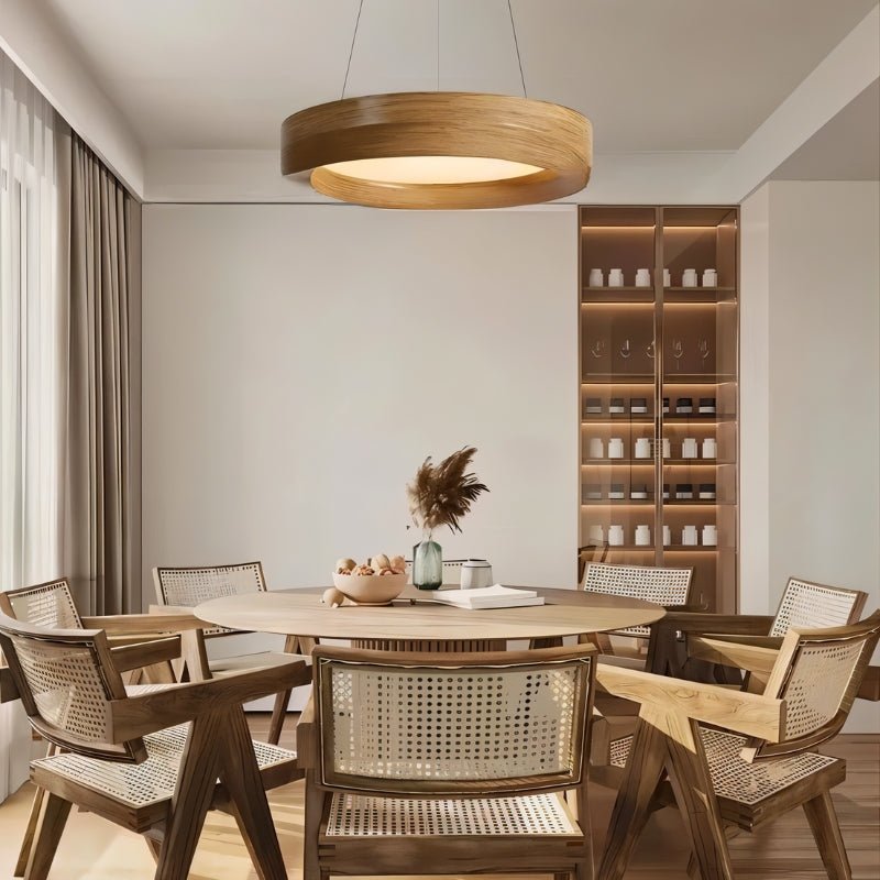 Modern dining room with wooden furniture and pendant light