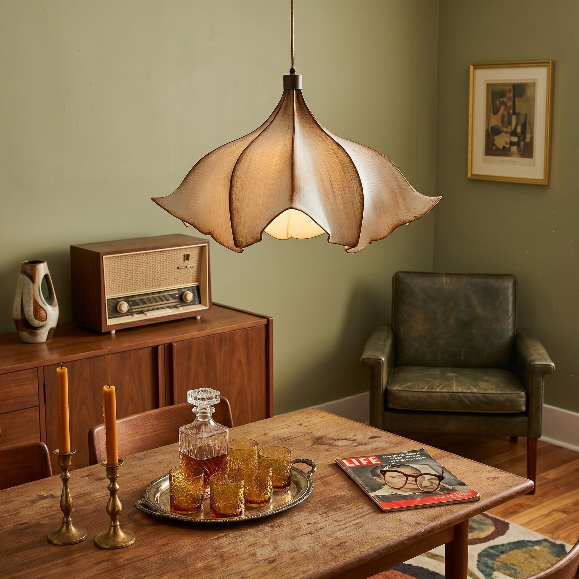 Vintage-style room with wooden table, lamp, and decor items.