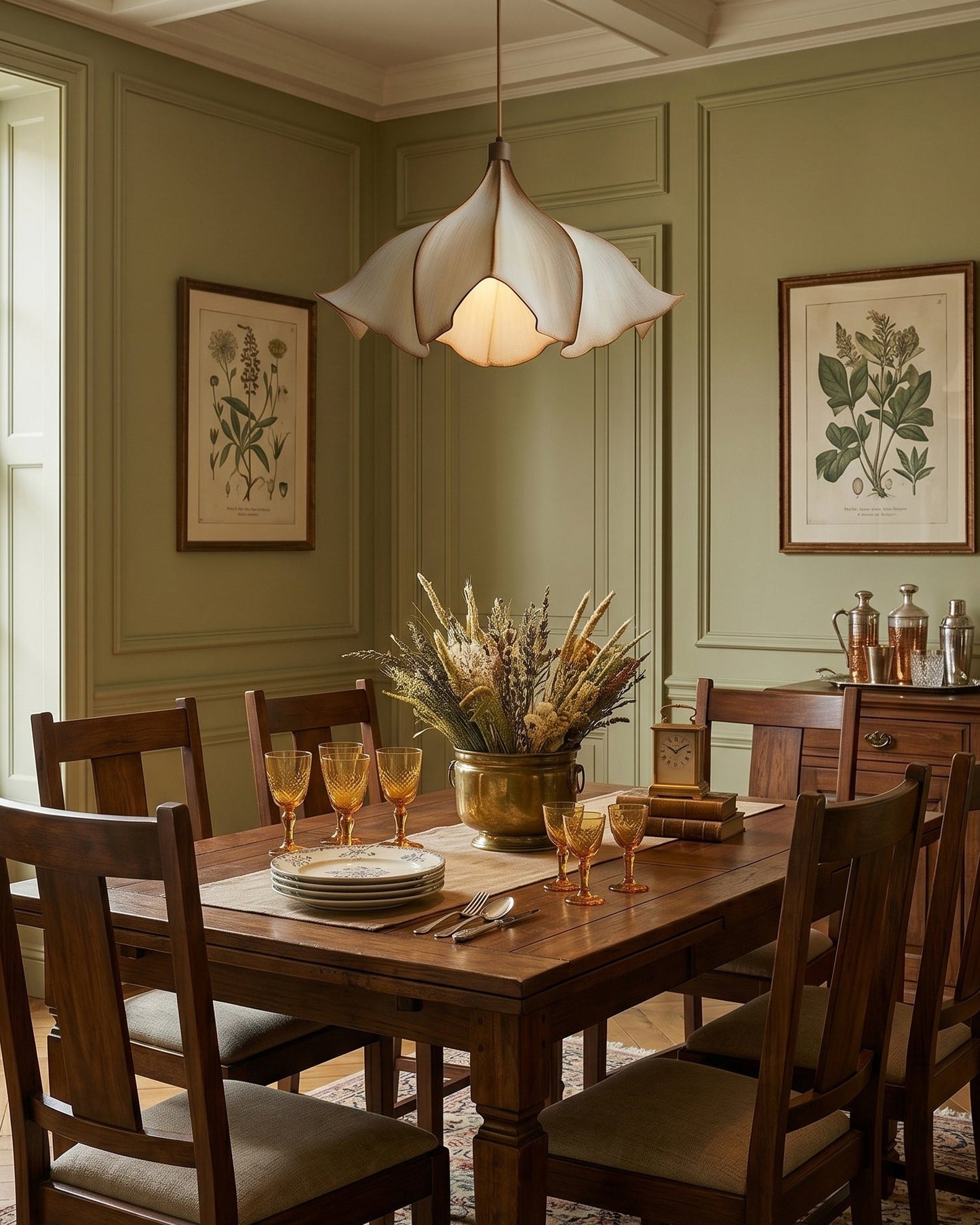 Dining room with wooden table, chairs, and decorative elements.