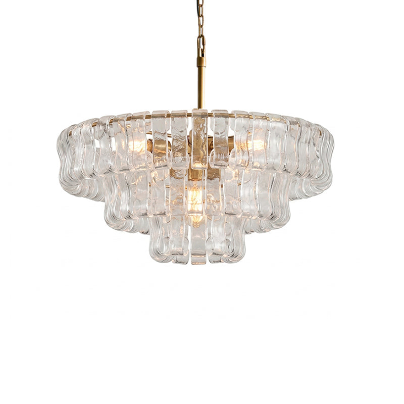 Clear glass chandelier with gold accents on a white background