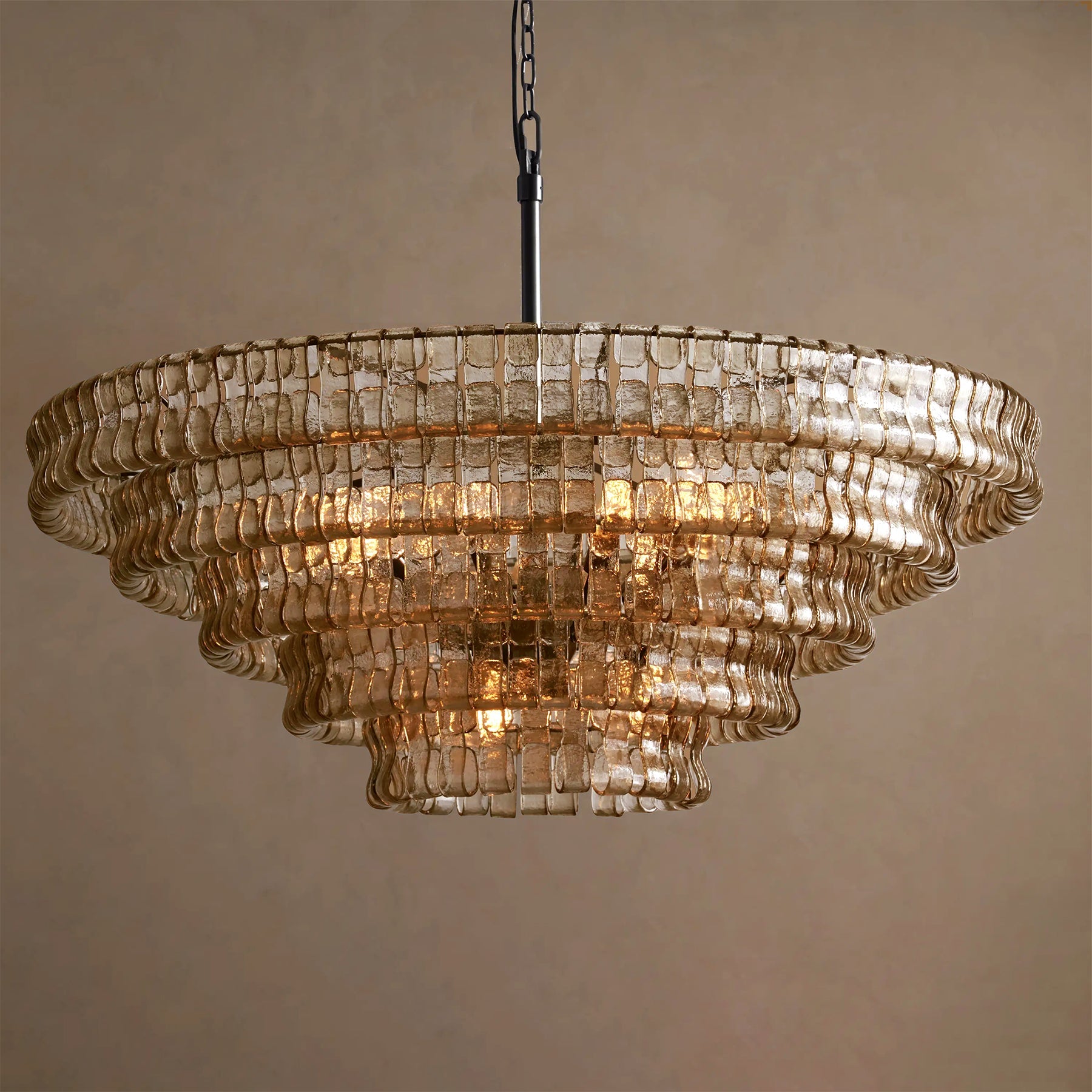 Decorative chandelier with glass panels on a beige background