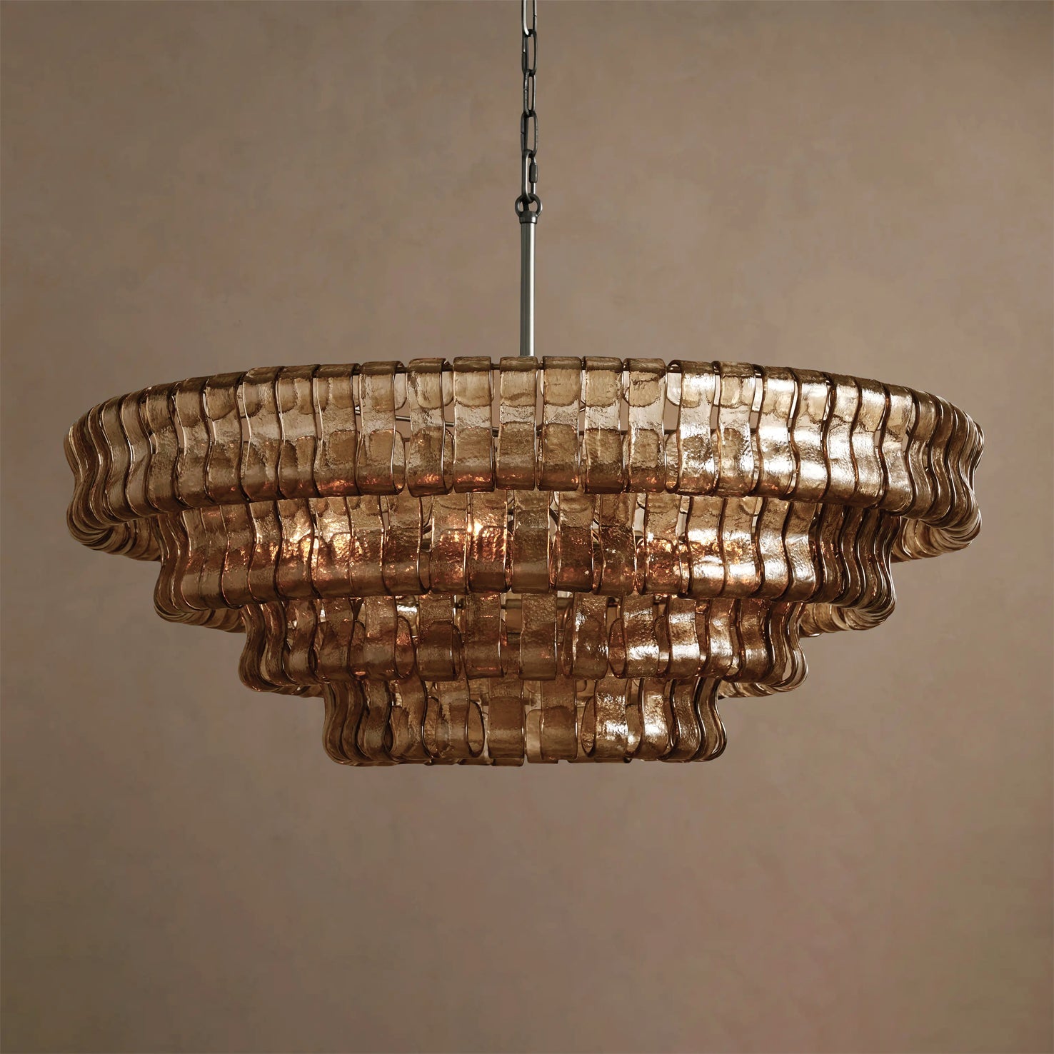 Decorative chandelier with wavy glass panels on a beige background