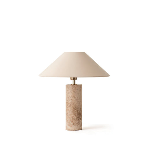 Table lamp with beige shade and marble base on a white background