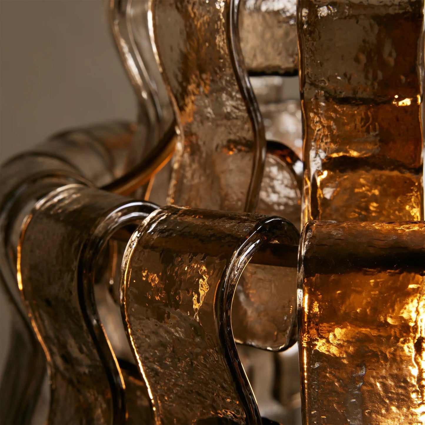 Close-up of a decorative glass object with a textured surface