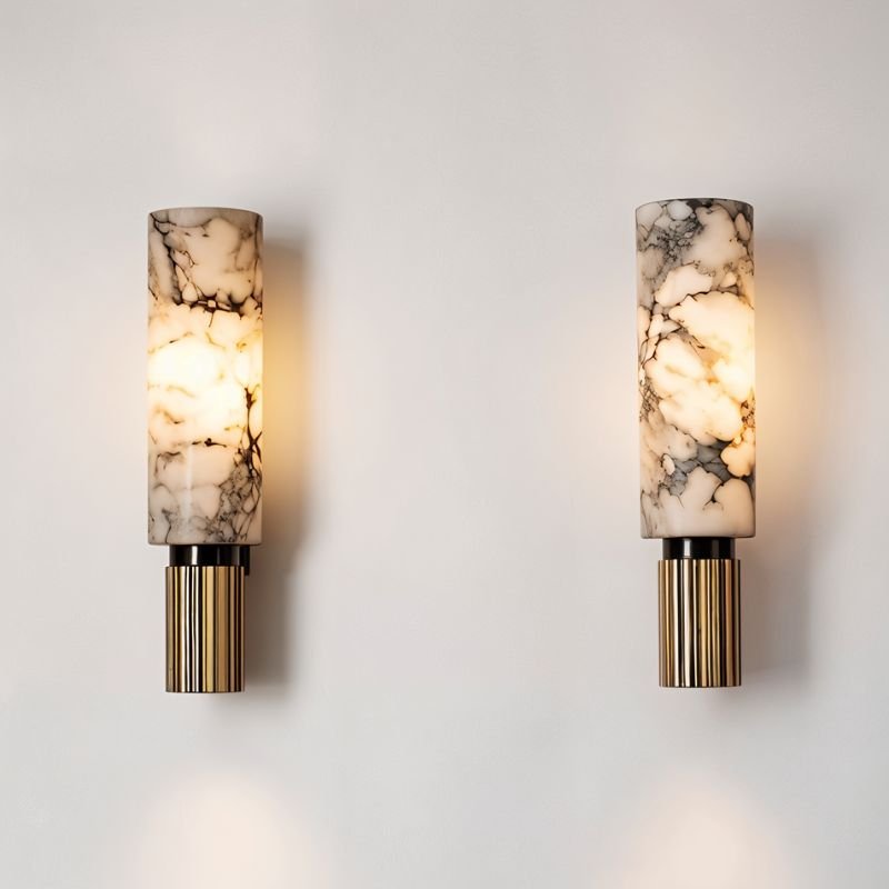 Two wall sconces with marble-patterned shades on a light gray wall.