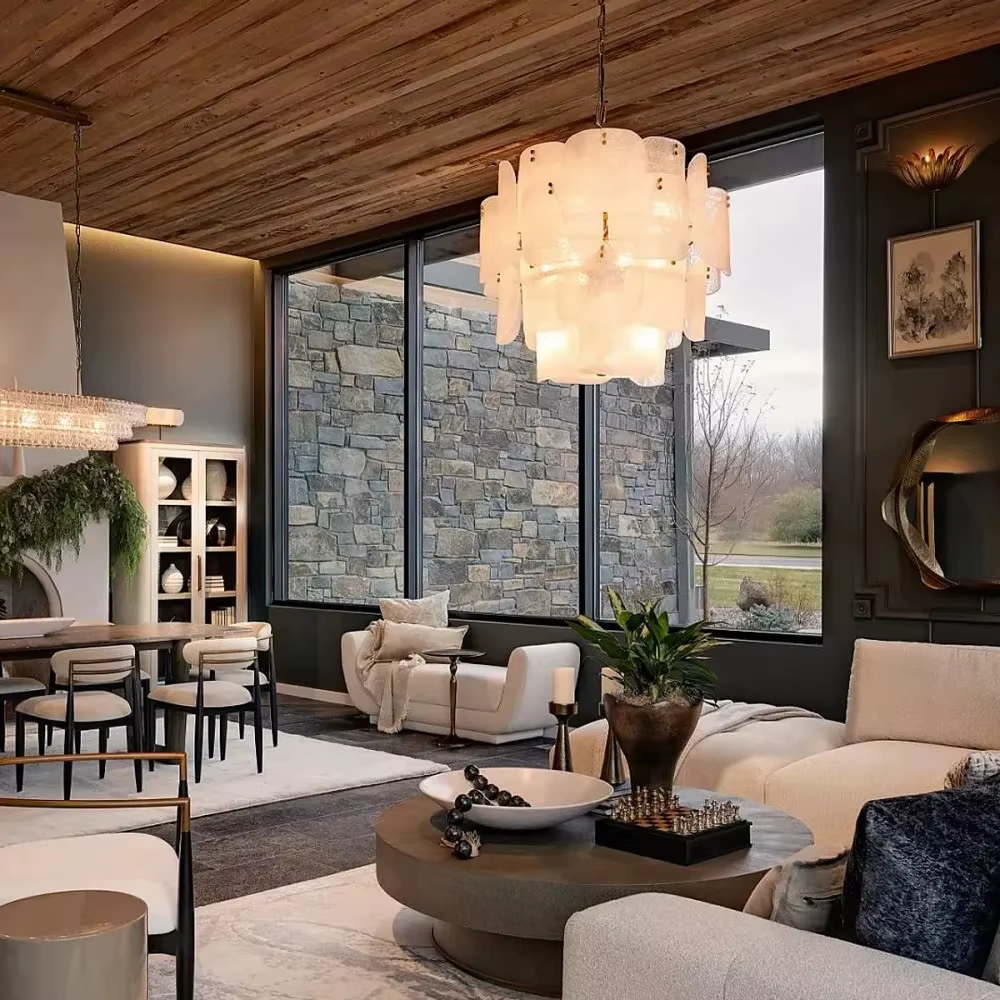 White layered frosted glass chandelier with brass-tone rivet details